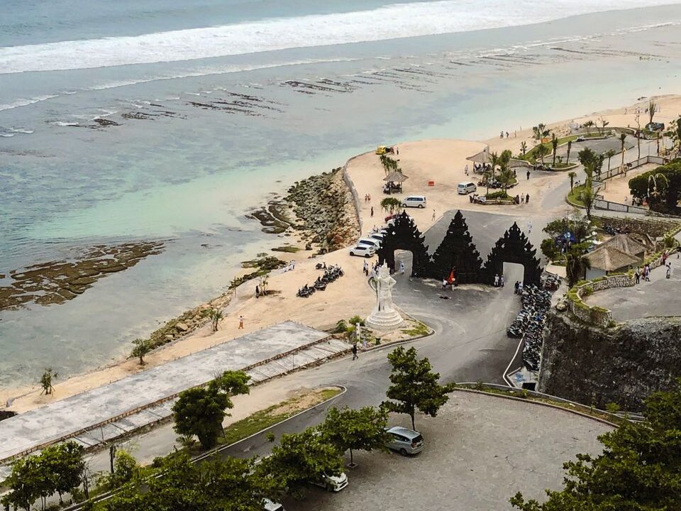 Aerial view of Melasti Beach and its gate