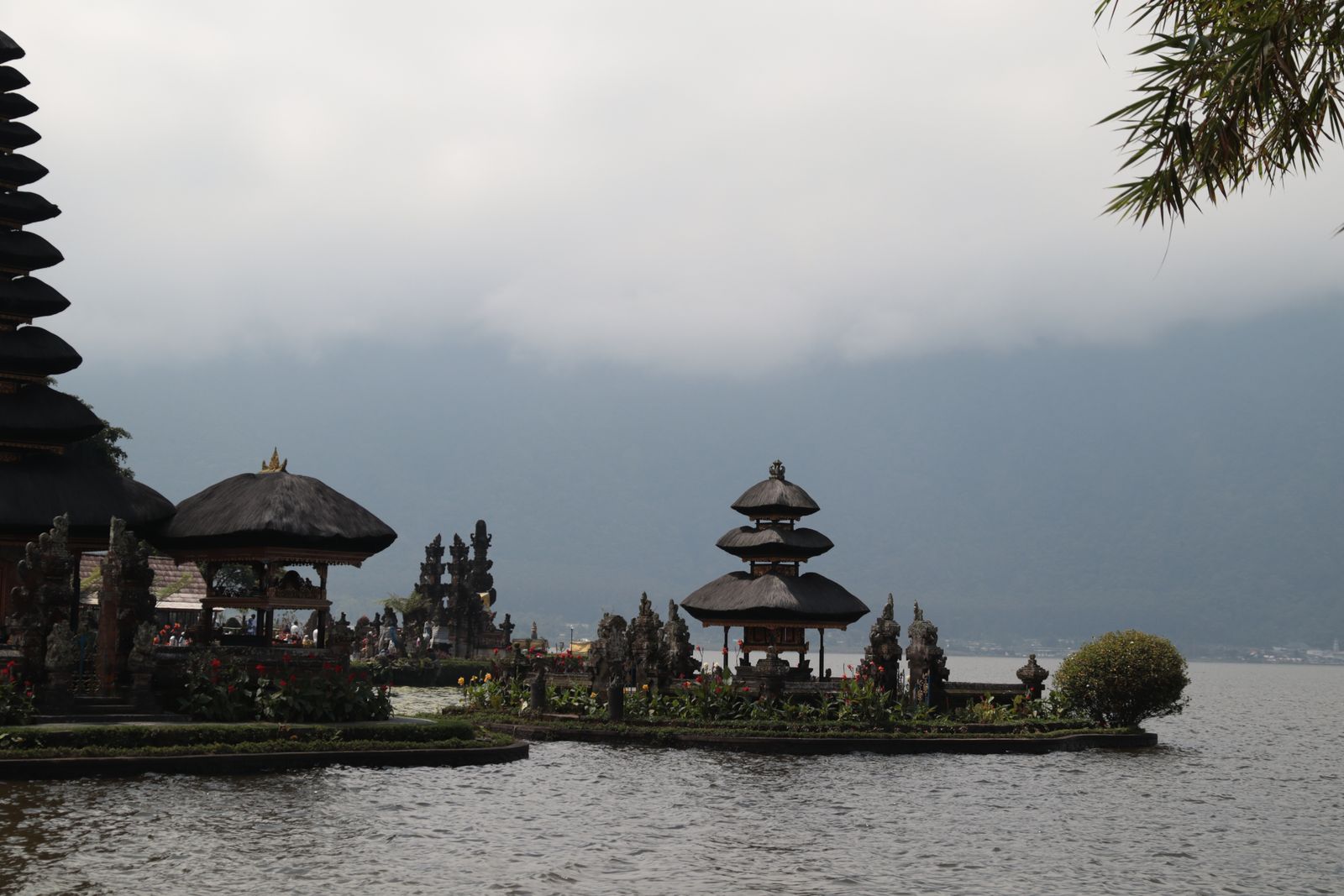 Ulun Danu Beratan Temple standing on Lake Bratan with mountains behind it in Bedugul, Bali