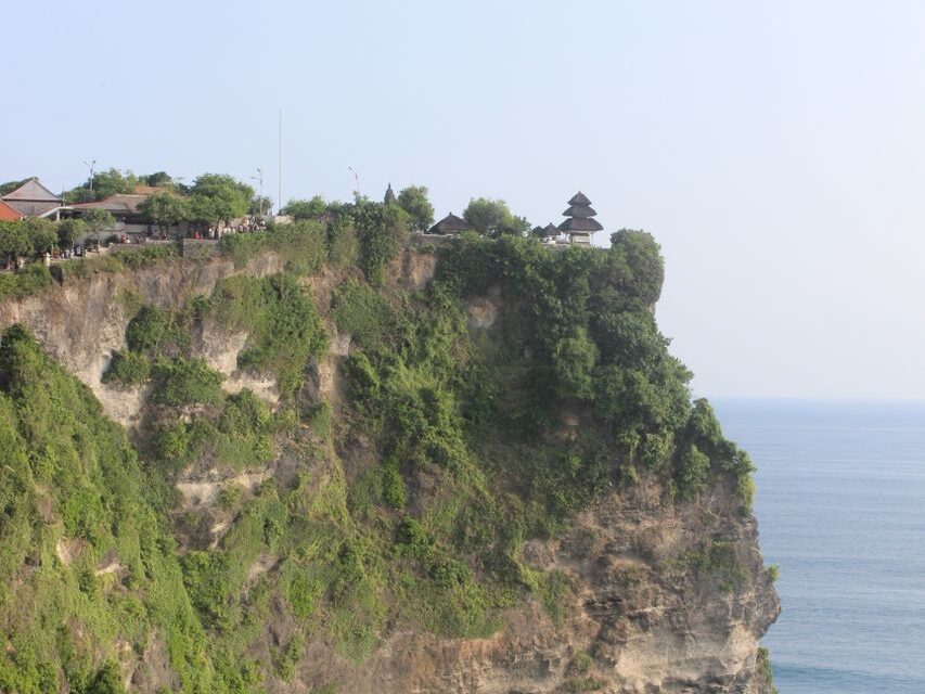 Uluwatu Temple on the cliff edge above the ocean