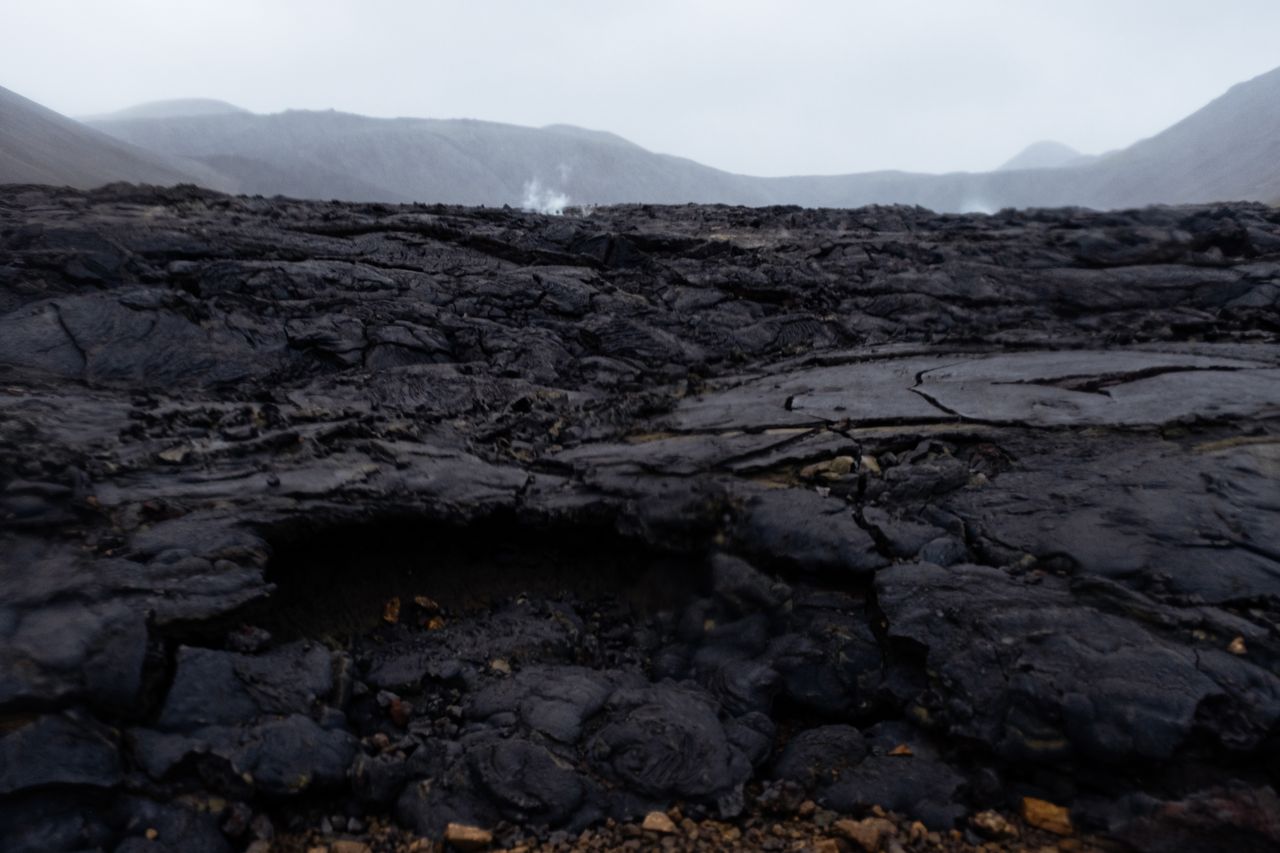 Dark volcanic lava rock landscape