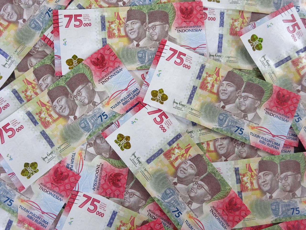 Indonesian rupiah banknotes, the cost of a Mount Batur sunrise jeep tour