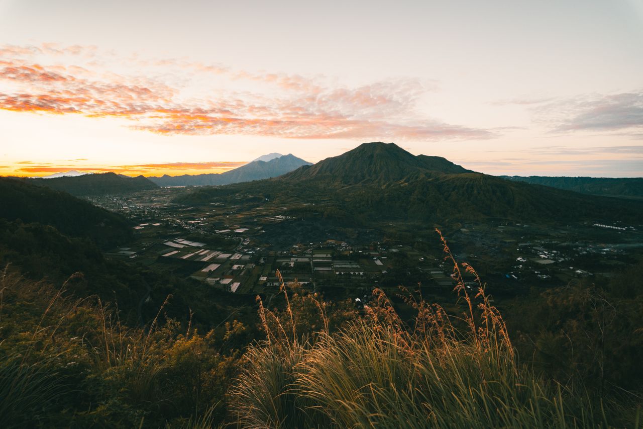 Golden sunrise over Mount Batur and the Kintamani caldera in Bali